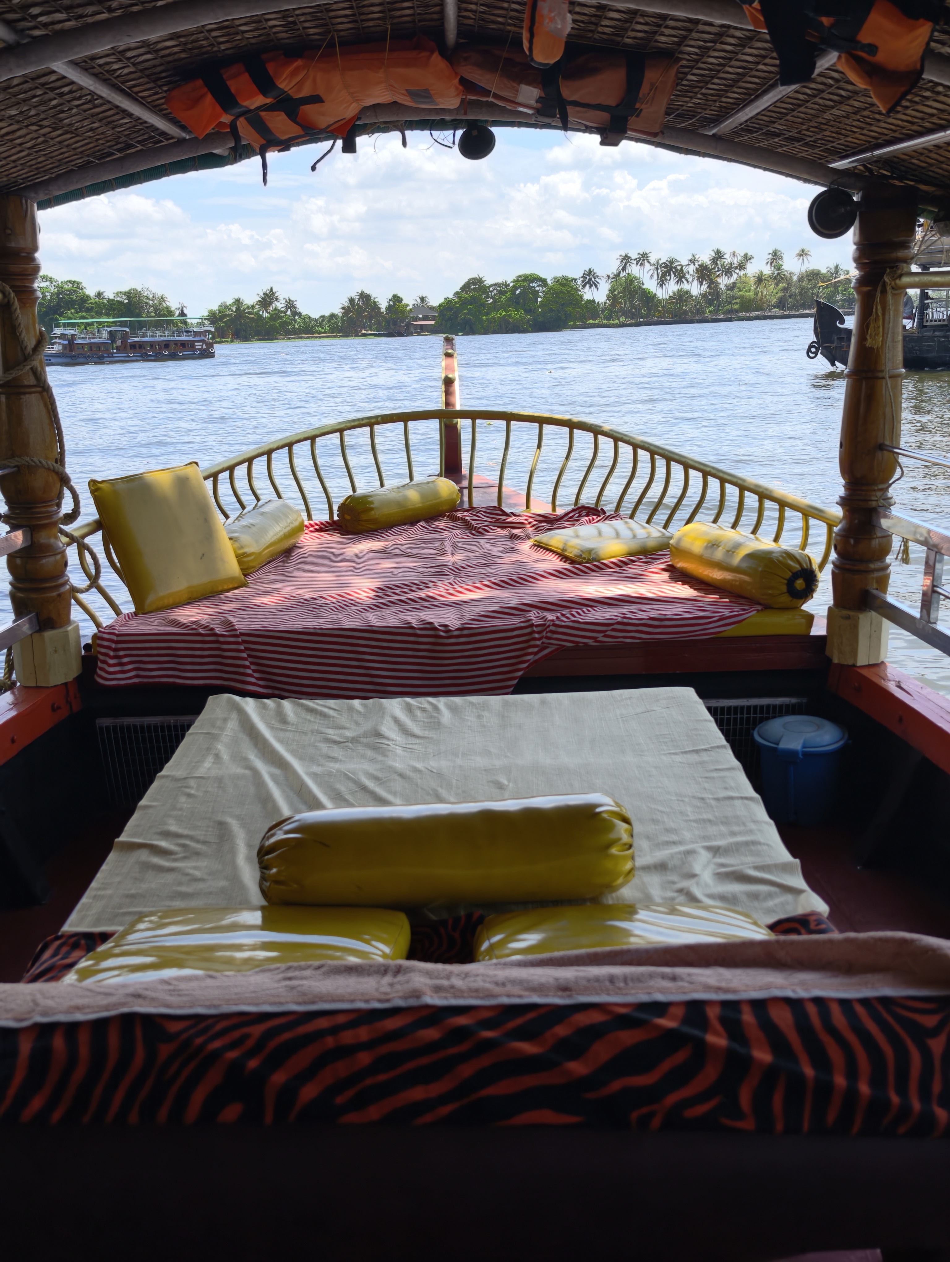 Keerthi Shikara Boat travelling through the Kerala backwaters